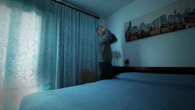 desperate lonely man at home, wide shot, low shutter