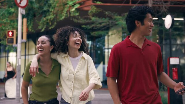 Video of group of friends having fun and talking while crossing the street.
