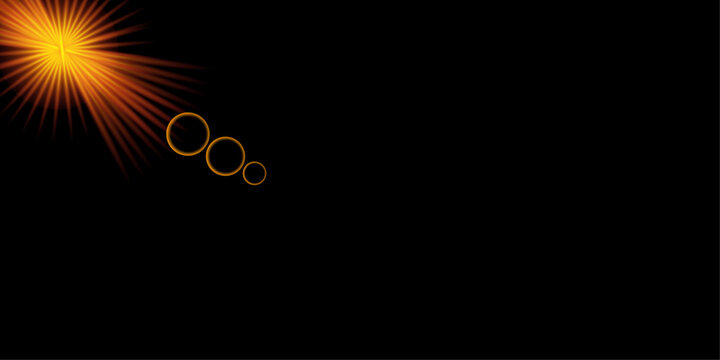 Abstract background featuring a bright light effect and coloring light flares on a deep black backdrop