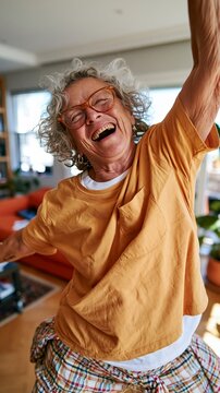 Elderly Woman Dancing in Yellow Shirt and Brown Skirt