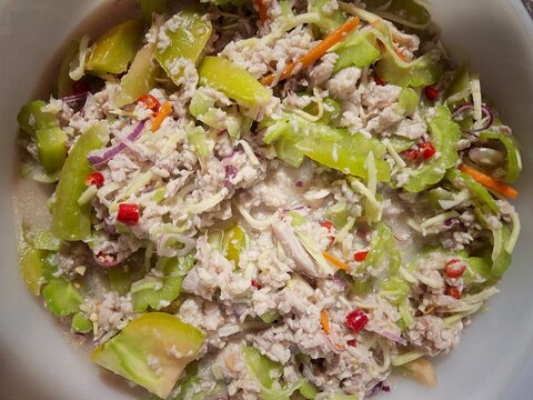 Traditional Sabah Hinava, a fresh Kadazan-Dusun fish salad prepared with lime, vegetables, chili and local ingredients.