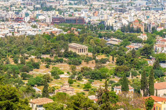A view towards the Temple of Hephaestus in the Agora of Athens from the southern slopes of the Acropolis hill in Athens, Greece in early summertime