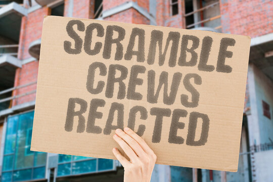 "Scramble Crews Reacted" Pilots and teams mobilized immediately. SCRAMBLE. CREWS. REACT. MOBILIZE. IMMEDIATE.