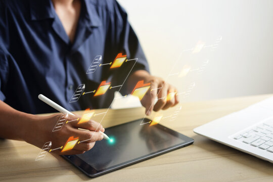 High Angle Of Hand Managing Files With Stylus Pen On Digital Tablet Inside Office