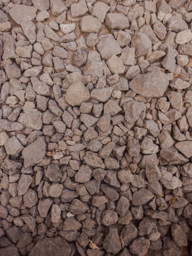 Close-up shot of crushed stone gravel texture background
