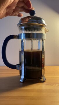 Making Fresh Coffee in a French Press vertical view
