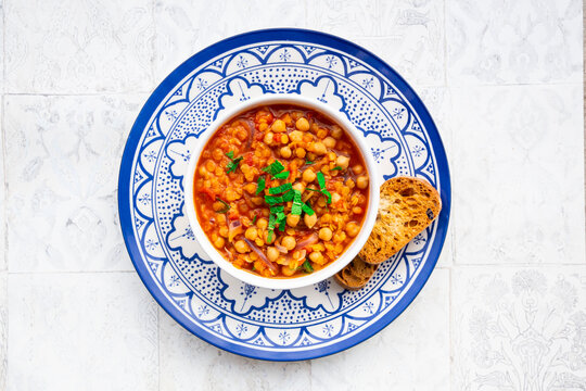 Lentil and chickpea soup (red lentils, chickpeas, tomatoes, red onions, mint)