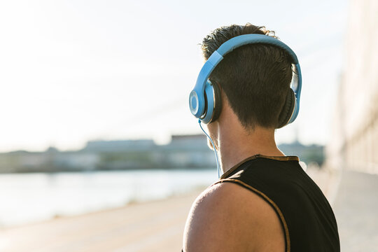 Young man with headphones looking at distance
