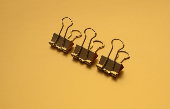 Golden binders on gold color background
