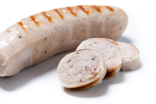 Grilled German bratwurst sausages isolated on white background