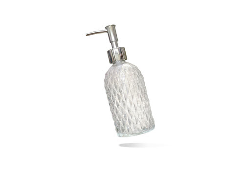 A clear glass perfume bottle with a diamond pattern floating on a white background.