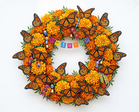Colorful wreath made for Day of the Dead with marigolds and butterfly decorations