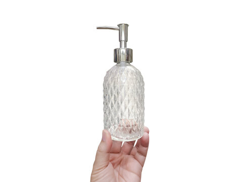 A clear glass perfume bottle with a diamond pattern is in the man's hand PNG transparent.