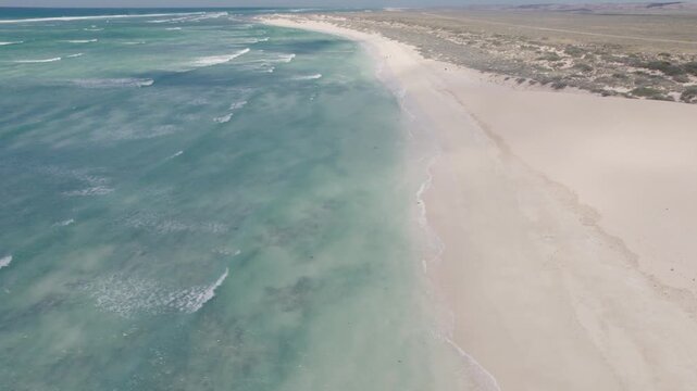 Empty Sandy Beach and Turquoise Waves at Turtle Nesting Site near Exmouth Western Australia, Aerial Drone Shot