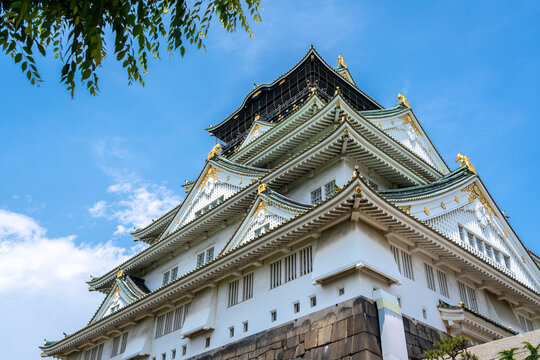 Main tower of Osaka Castle in Japan on sunny day