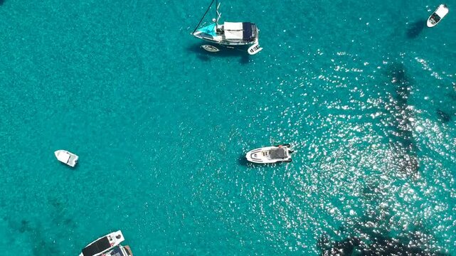 Boats Anchored in Crystal Clear Turquoise Water Top Down Drone View Cala Macarella Menorca Spain Balearic Islands