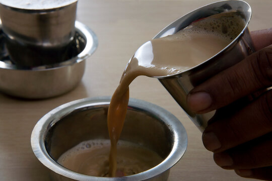 Filter coffee being poured into a dabarah 