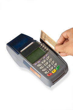 Hand swiping credit card 