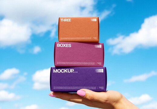 Three Color Boxes In Hand Mockup