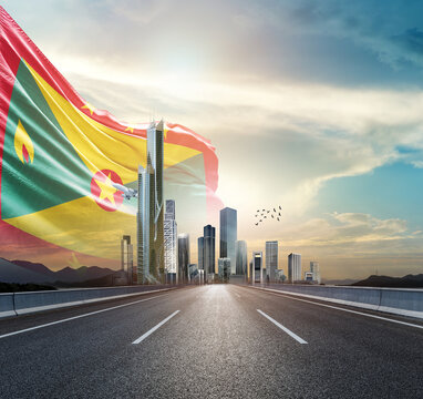 Grenada national flag waving behind the cityscape. Grenada national flag for independence day.