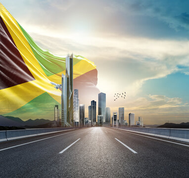 Jamaica national flag waving behind the cityscape. Jamaica national flag for independence day.