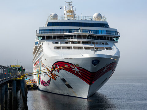 Ketchikan, Alaska, USA - June 1, 2022: Norwegian Jewel cruise liner docked at Ward Cove cruise ship terminal in Ketchikan in fog
