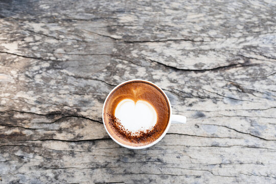 cappuccino on dark old grunge with flat lay top view