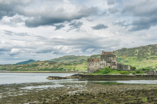 Eilean Donan Castle, on a loch, a traditional tower house, fortified house, built in the 13th century.