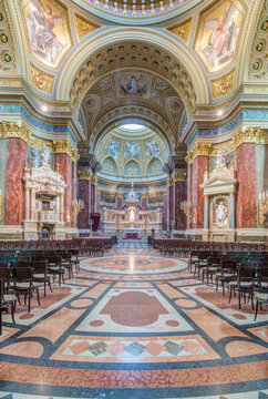 St. Stephen's Basilica, Szent Istv&aacute;n Bazilika, the 19th century cathedral, coffered archway and painted panels, carved statues and stonework and tiled floors
