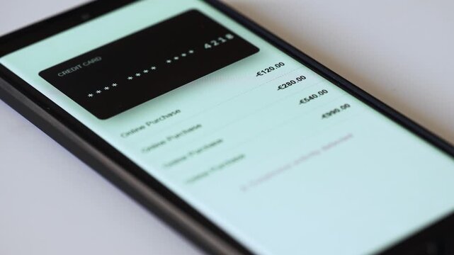 Smartphone screen showing unauthorized transactions and suspended bank account notification.