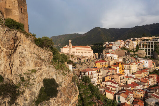 Elevated view of the hilltop town of Scilla, Castello Ruffo and Chiesa Maria Santissima Immacolata historic buildings.