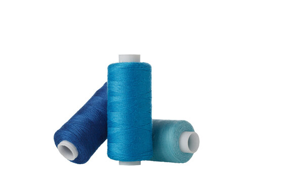blue spool of sewing thread isolated on white background close up