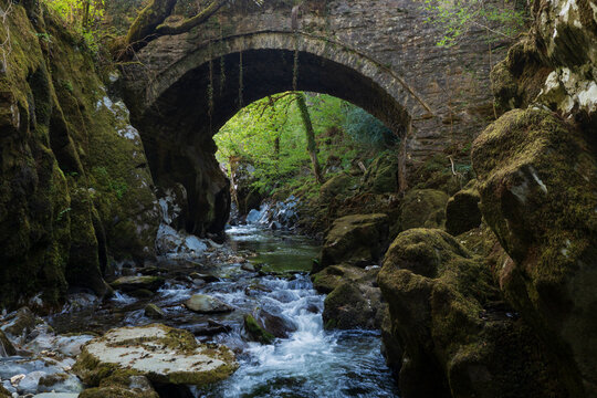 Penmachno Roman Bridge, here is a drystone-built, packhorse bridge over the Machno river called the  'Roman Bridge' but it is actually 16th or 17th century.[