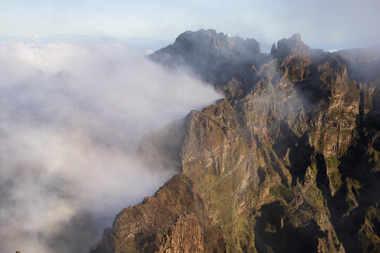 View from Vereda do Pico Ruivo over the mountains at Sunset, mist and clouds rolling in