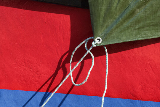 Fishing Boat Cover in a fishing port.