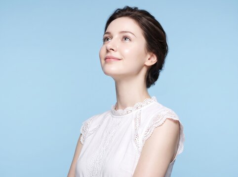 Woman studio portrait blue background - studio fashion portrait