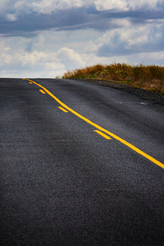 A road in the country with a passing lane.