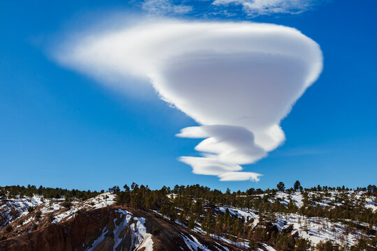Lenticular Cloud in the High Atlas Mountains, Altocumulus lenticularis, commonly known as lenticular clouds.