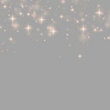 Golden bokeh dust floats with brilliant glitter and glowing festive flare. Elegant transparent effect for celebration backgrounds. PNG illustration.