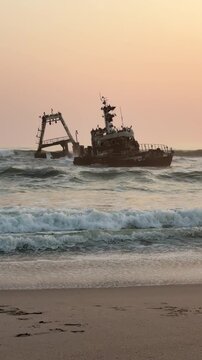 The Zeila shipwreck at sunset on the Skeleton Coast in Namibia, southwest Africa.