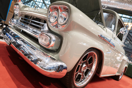 Chevrolet Apache classic pickup featuring quad headlights, chrome grille, custom alloy wheels and restored vintage bodywork.
