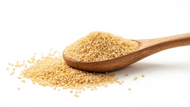 Wooden spoon with raw organic semolina, isolated on white, side view.