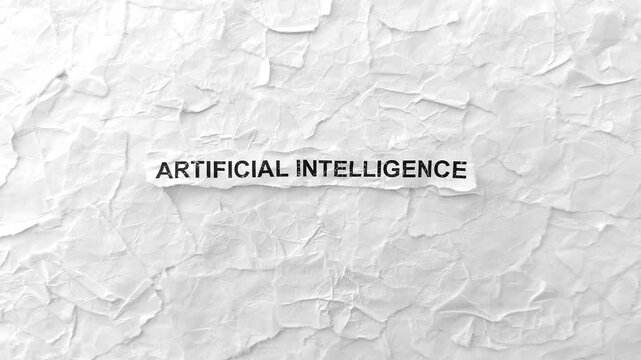 Crumpled piece of paper with words Artificial Intelligence on torn crumpled white paper pieces background.