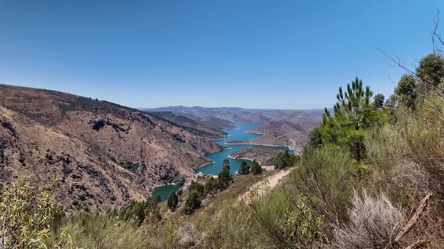 Scenic valley with river meandering from miradouro da serpente do medal
