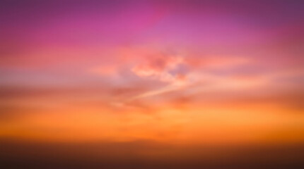 Fototapeta premium Abstract Blurred Background with Gradient Colors of Purple, Pink and Orange Sunset Sky