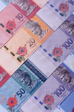 Malaysian ringgit banknotes as a tool for trade and financial transactions. The Malaysian ringgit