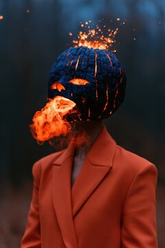 Surreal flaming pumpkin head portrait with fire breath and glowing eyes for halloween banner and poster design
