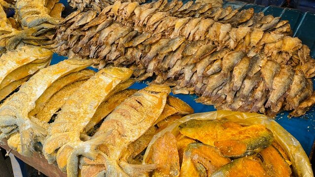 Assorted salted hilsa and dried fish displayed at market stall