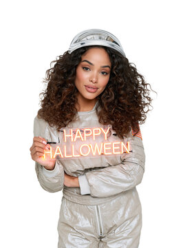 Beautiful Woman in Spacesuit Holding Neon Happy Halloween Sign isolated on transparent or white background, png