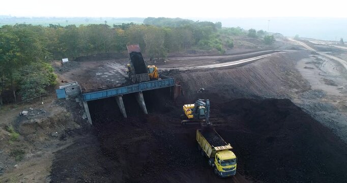Aerial Drone View of Excavator Loading Coal with Transportation in Gujarat, India